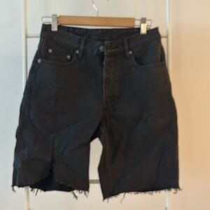 Stylish black denim long short cutoffs. Mid-rise, distressed